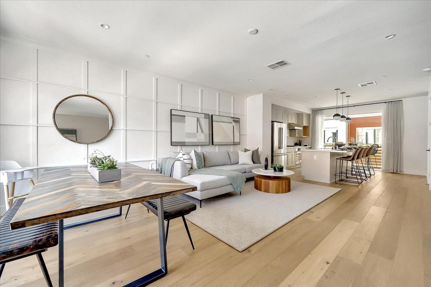 567 Pilgrim Drive Foster City, CA 94404 - Photo 4 of 14 a living room with furniture and a wooden floor