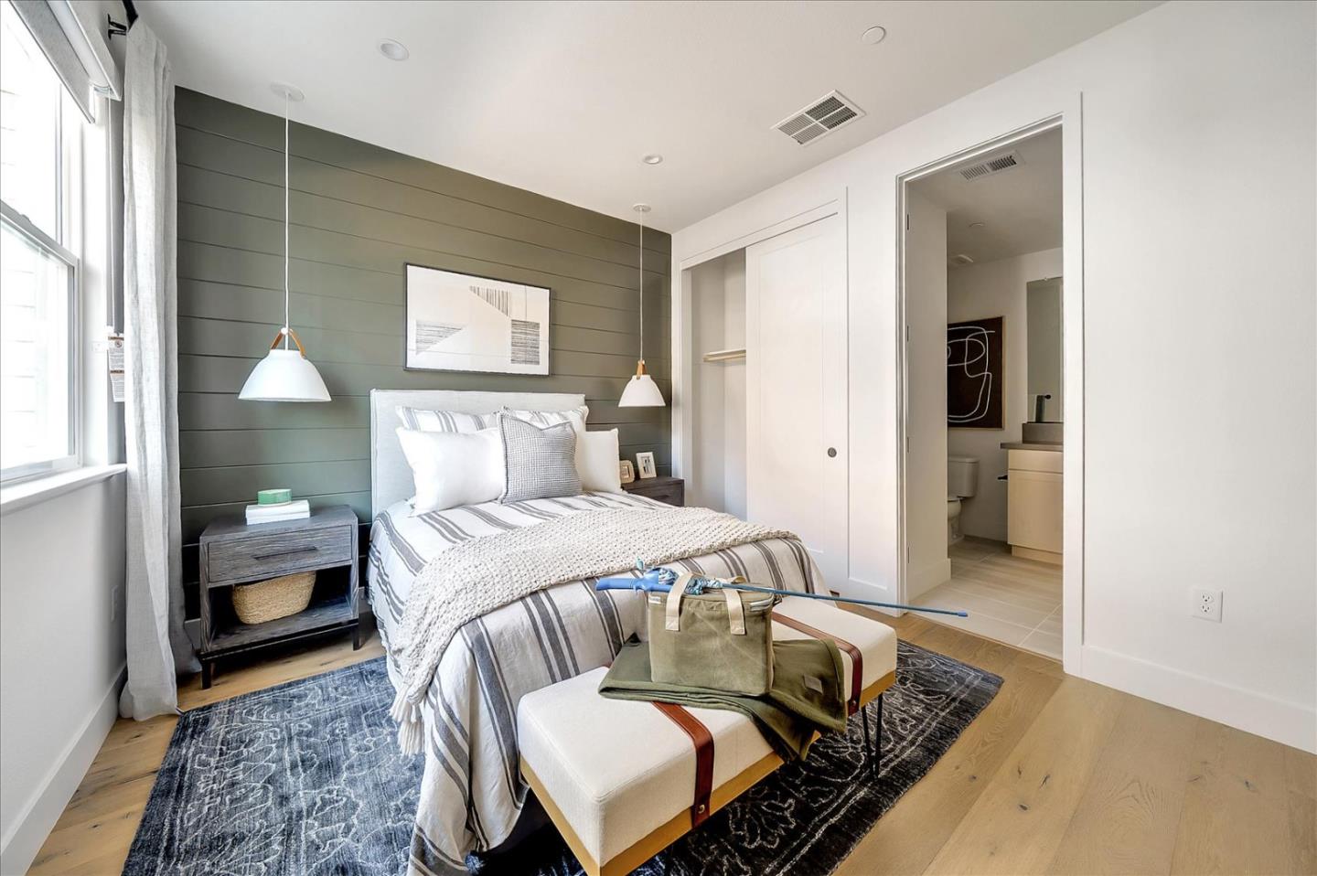 567 Pilgrim Drive Foster City, CA 94404 - Photo 8 of 14 a bedroom with a bed and wooden floor