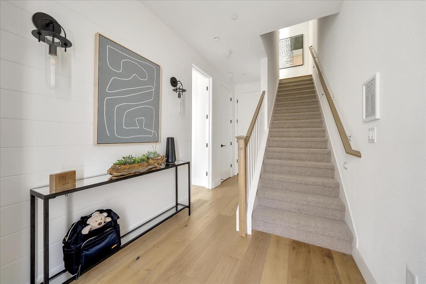 567 Pilgrim Drive Foster City, CA 94404 - Photo 10 of 14 a view of a hallway with stairs