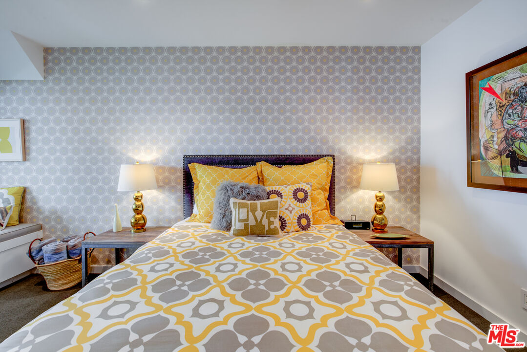 3544 Sunset Lane Oxnard, CA 93035 - Photo 29 of 56 a bedroom with a bed and a lamp on dresser