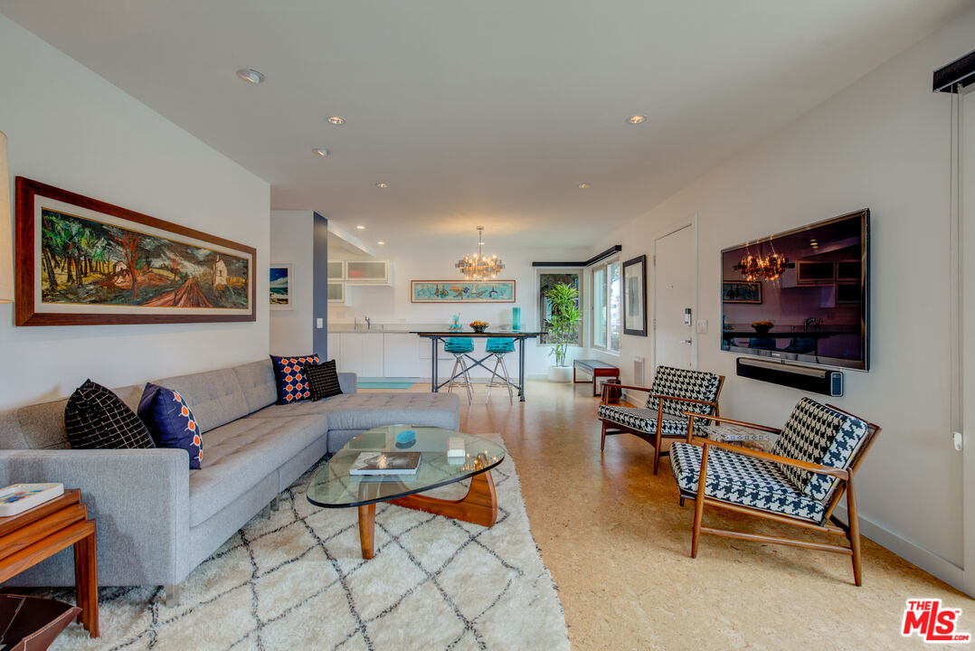 3544 Sunset Lane Oxnard, CA 93035 - Photo 10 of 56 a living room with furniture and a flat screen tv