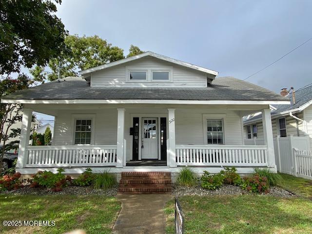 a view of a porch with a garden