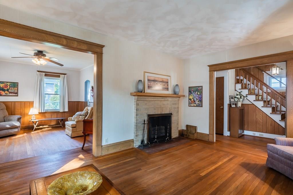 38 Castle Street Springfield, MA 01118 - Photo 14 of 41 a living room with furniture and a fireplace