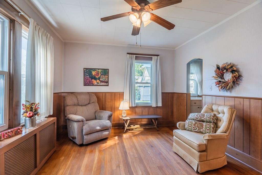 38 Castle Street Springfield, MA 01118 - Photo 15 of 41 a living room with furniture and wooden floor