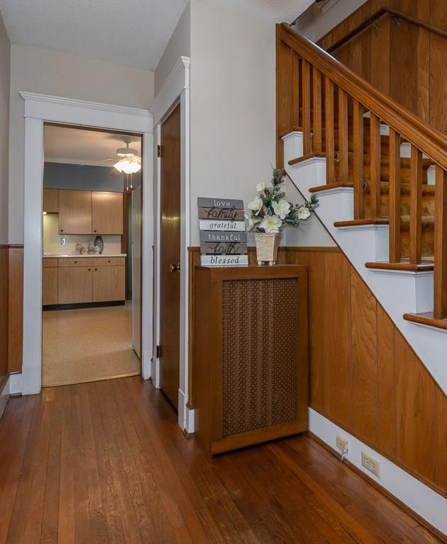 38 Castle Street Springfield, MA 01118 - Photo 25 of 41 a view of a hallway with wooden floor and staircase