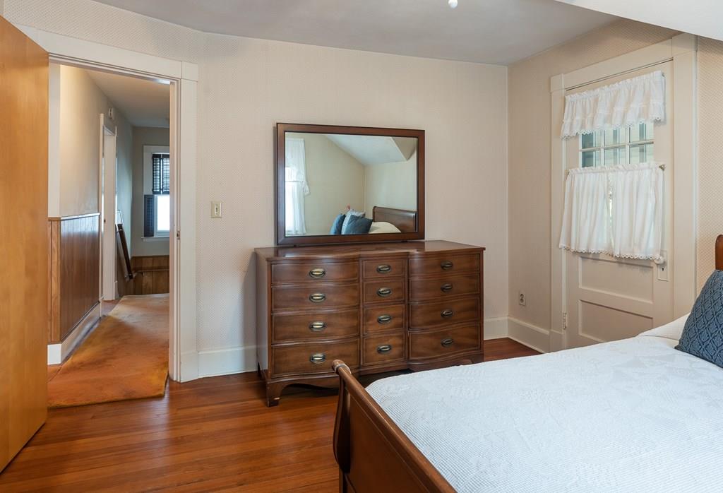38 Castle Street Springfield, MA 01118 - Photo 33 of 41 a bedroom with a bed and a dresser
