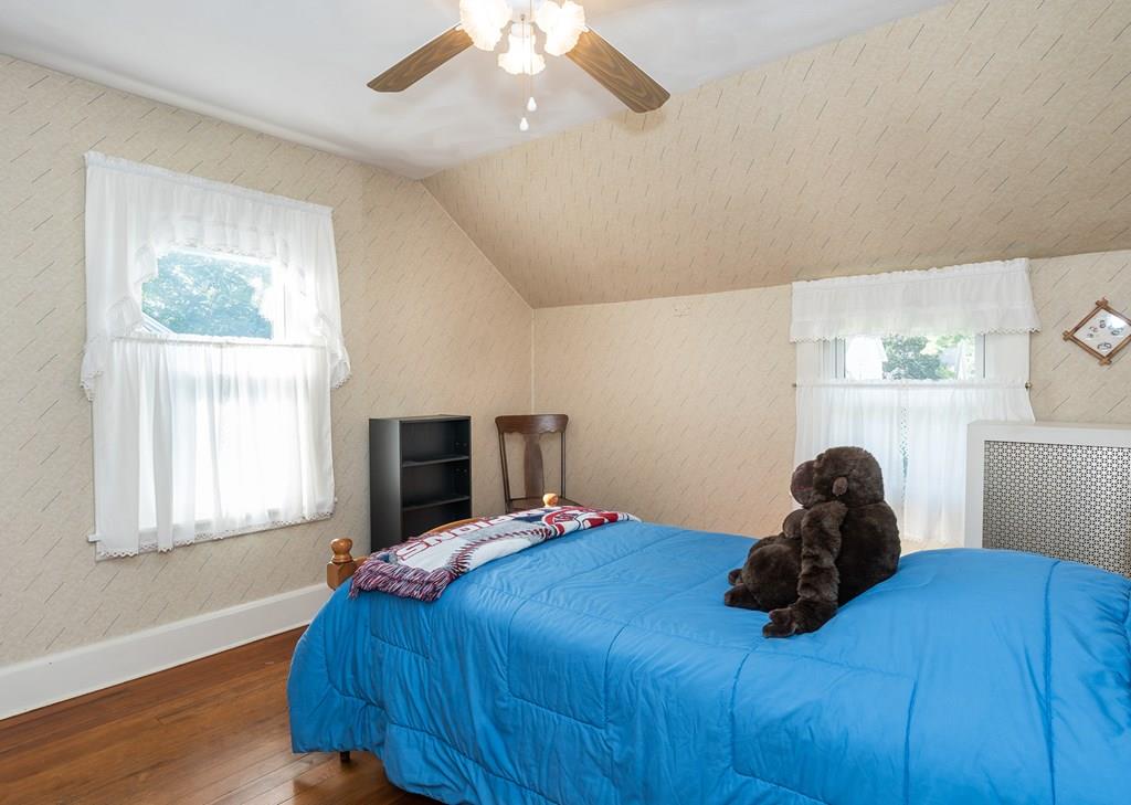 38 Castle Street Springfield, MA 01118 - Photo 36 of 41 a bedroom with a bed and a window