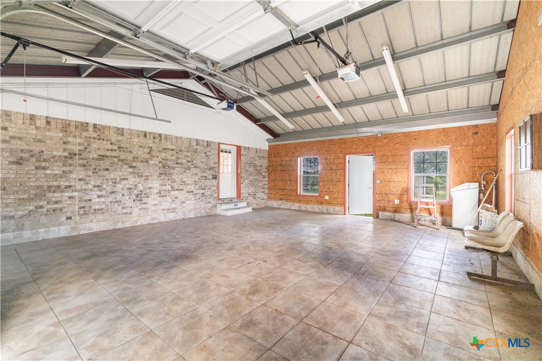 1033 Farm To Market 1351 Goliad, TX 77963 - Photo 19 of 34 a view of an empty room with a window