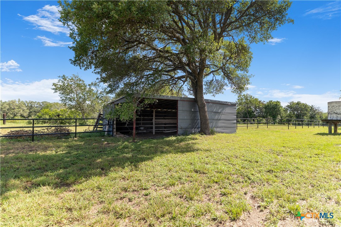 1033 Farm To Market 1351 Goliad, TX 77963 - Photo 27 of 34 a view of a yard with an outdoor space