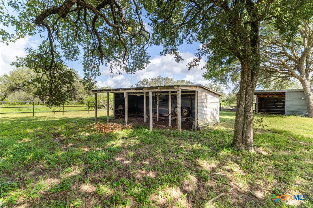 1033 Farm To Market 1351 Goliad, TX 77963 - Photo 28 of 34 a front view of house with yard and green space
