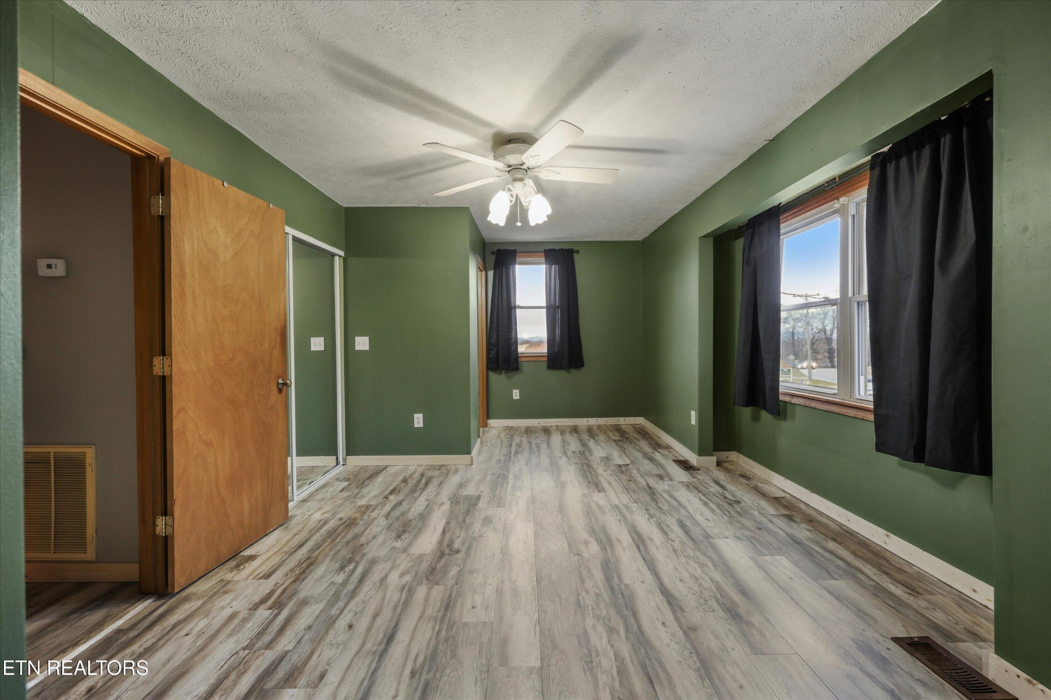47 Paint Rock Ferry Road Kingston, TN 37763 - Photo 18 of 38 a view of empty room with window and ceiling fan