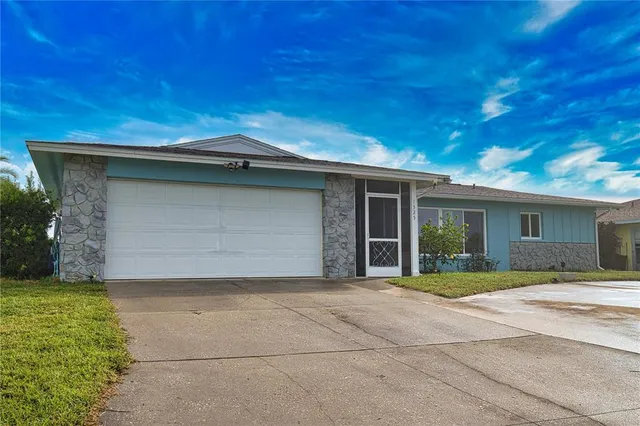 a house view with a garden space
