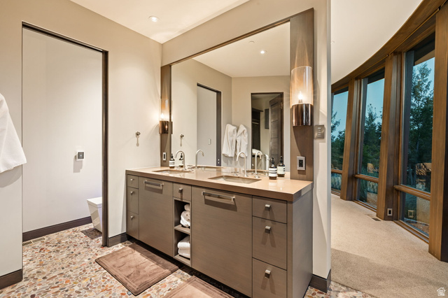 8544 North Promontory Ranch Road Park City, UT 84098 - Photo 31 of 36 Full bathroom with double vanity and light carpet