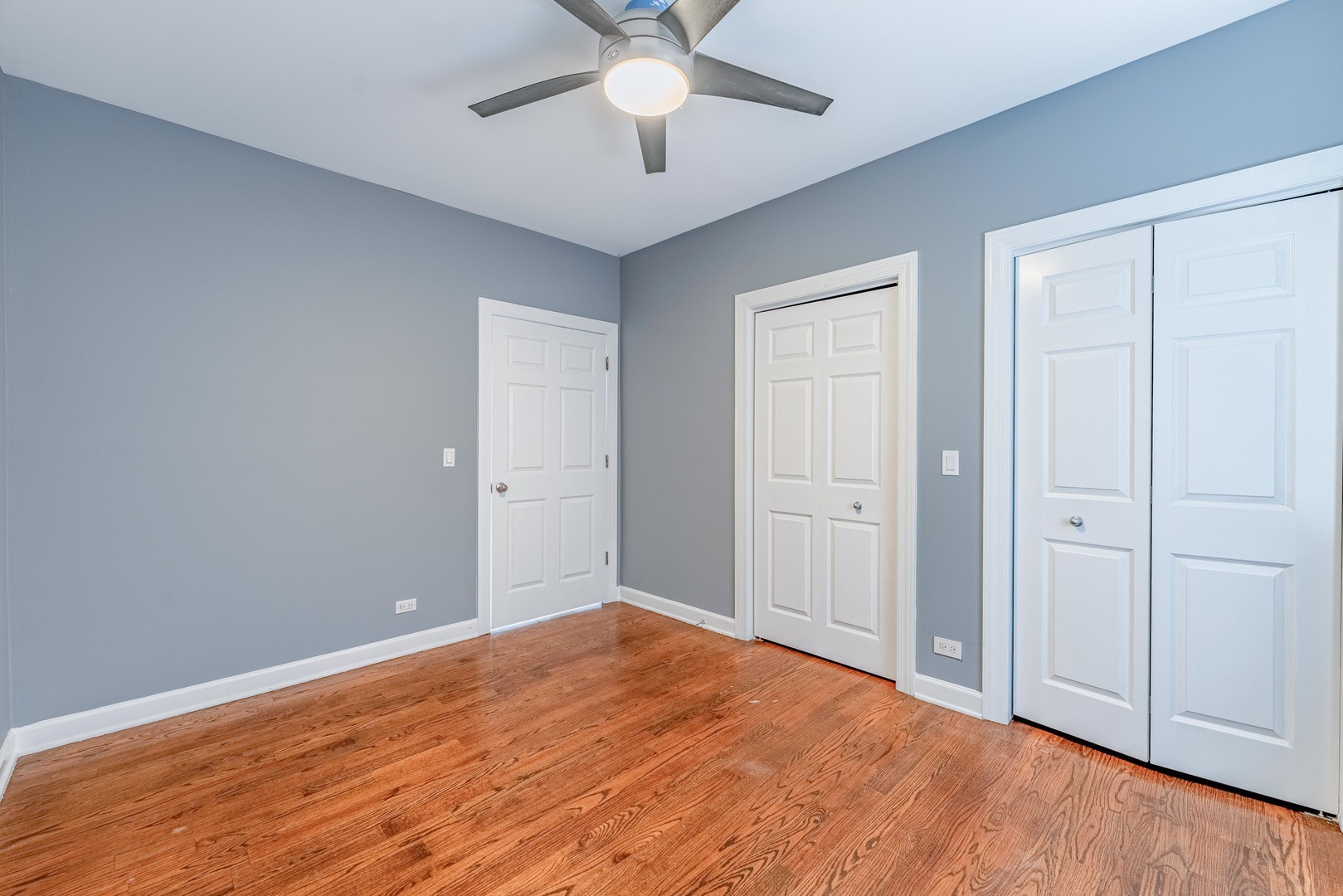4011 West Fullerton Avenue, Unit 2E Chicago, IL 60639 - Photo 15 of 32 a view of a livingroom with a chandelier fan