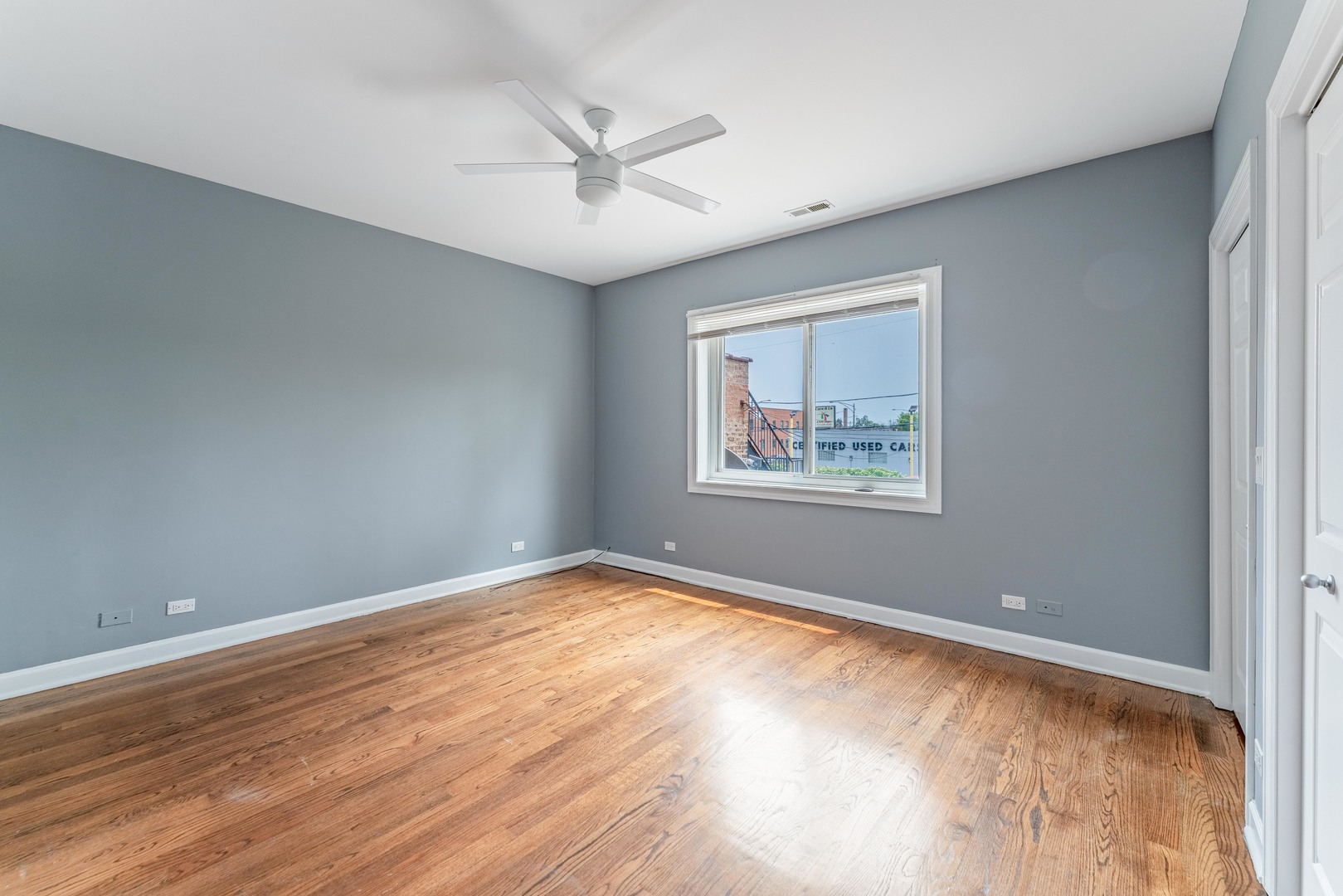 4011 West Fullerton Avenue, Unit 2E Chicago, IL 60639 - Photo 19 of 32 a view of an empty room with a window