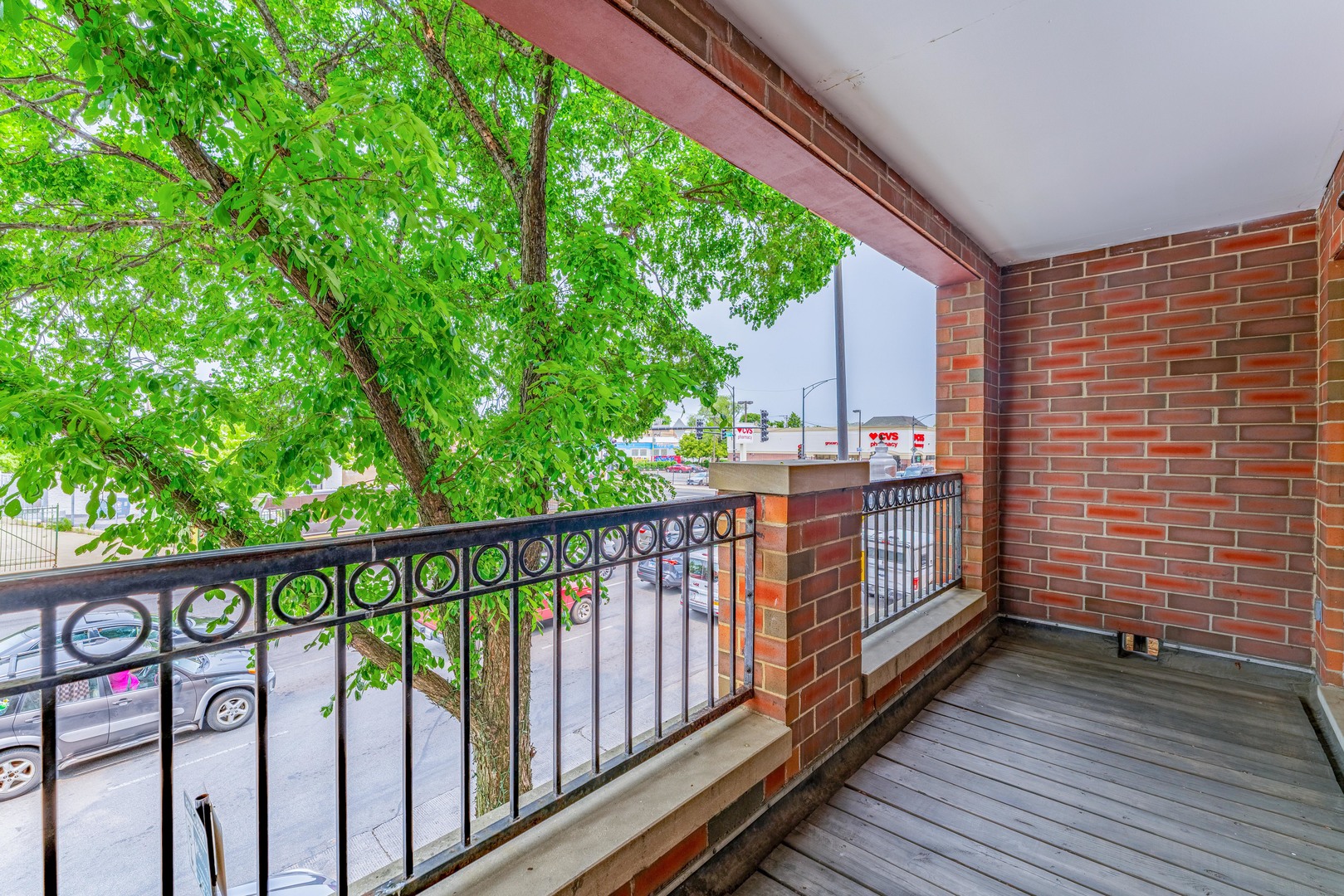 4011 West Fullerton Avenue, Unit 2E Chicago, IL 60639 - Photo 25 of 32 a view of balcony with wooden floor