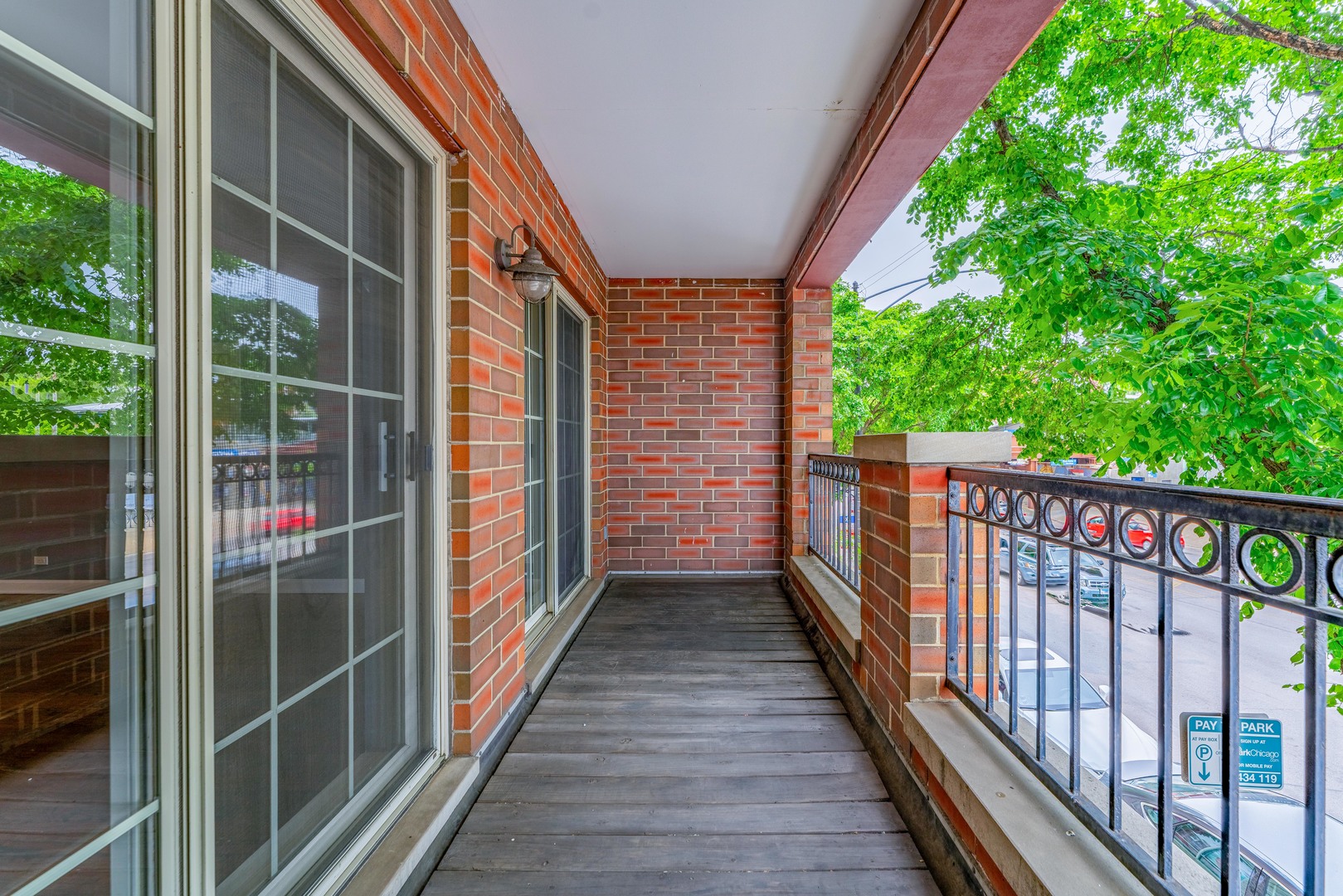 4011 West Fullerton Avenue, Unit 2E Chicago, IL 60639 - Photo 27 of 32 a view of balcony with wooden floor