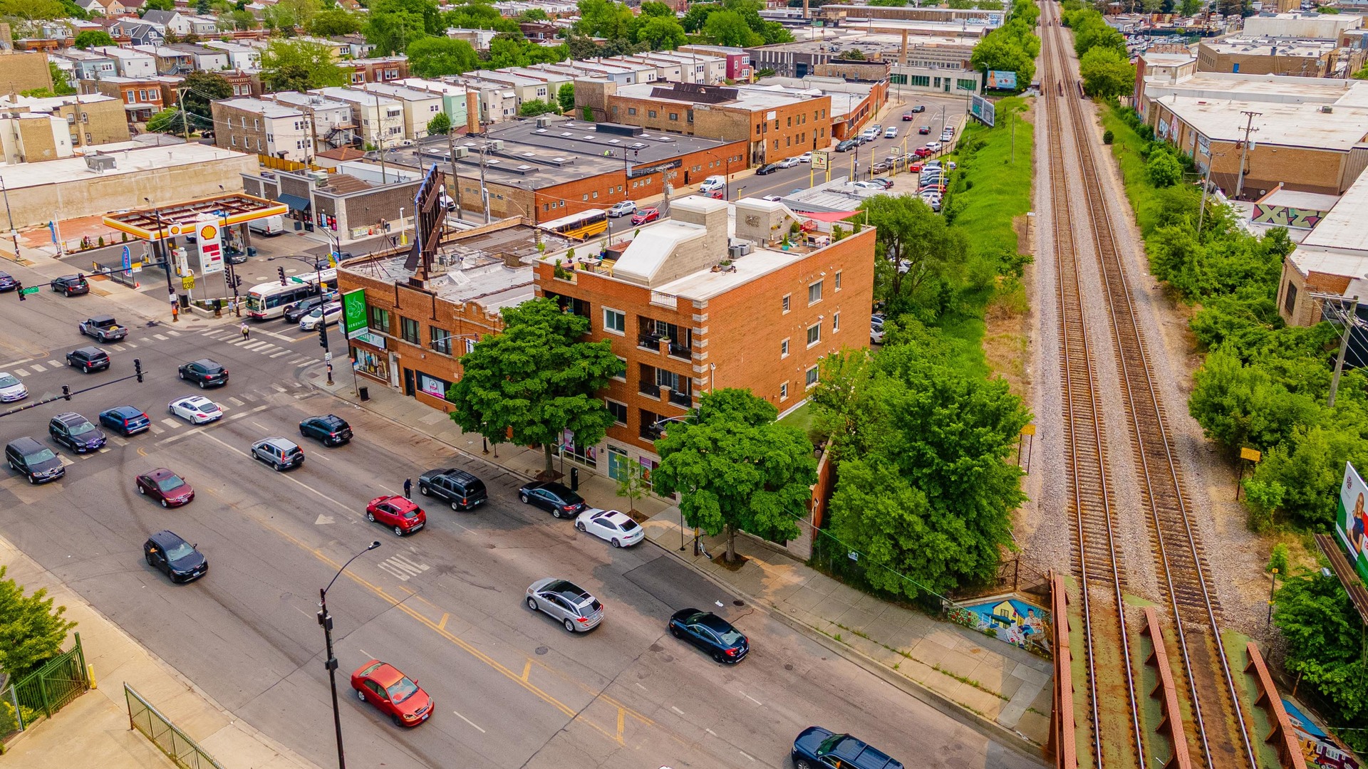 4011 West Fullerton Avenue, Unit 2E Chicago, IL 60639 - Photo 3 of 32 an aerial view of a houses with outdoor space