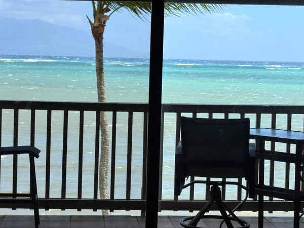 a view of a chairs on the roof deck