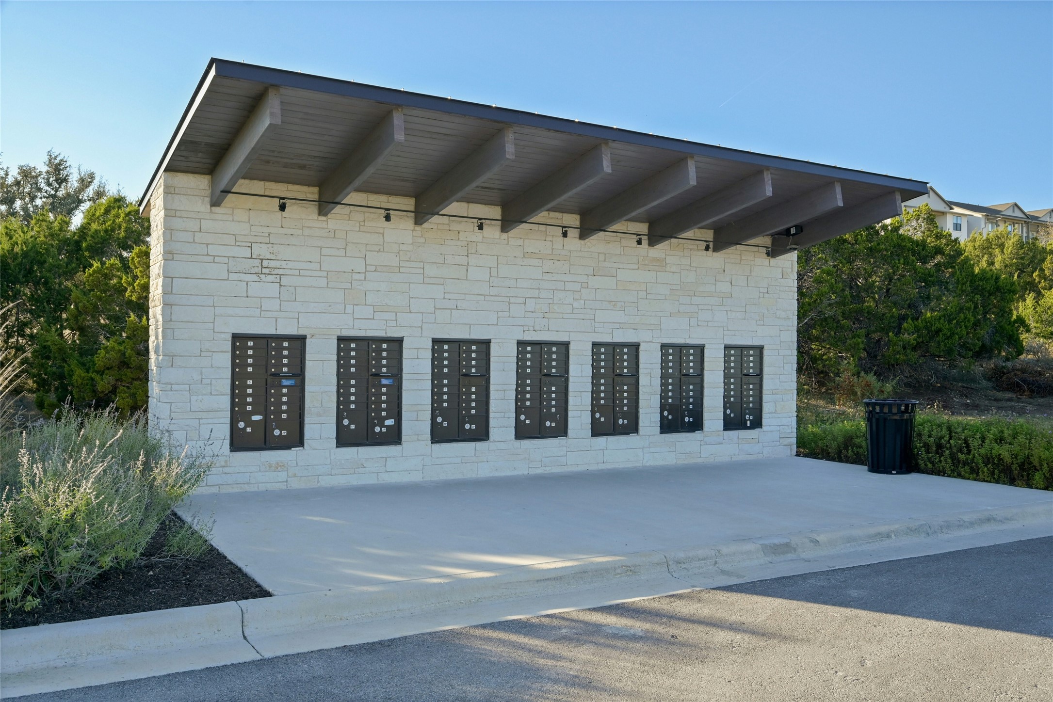 5905 Madrone Tree Lane Austin, TX 78738 - Photo 11 of 25 a front view of a house with a garden