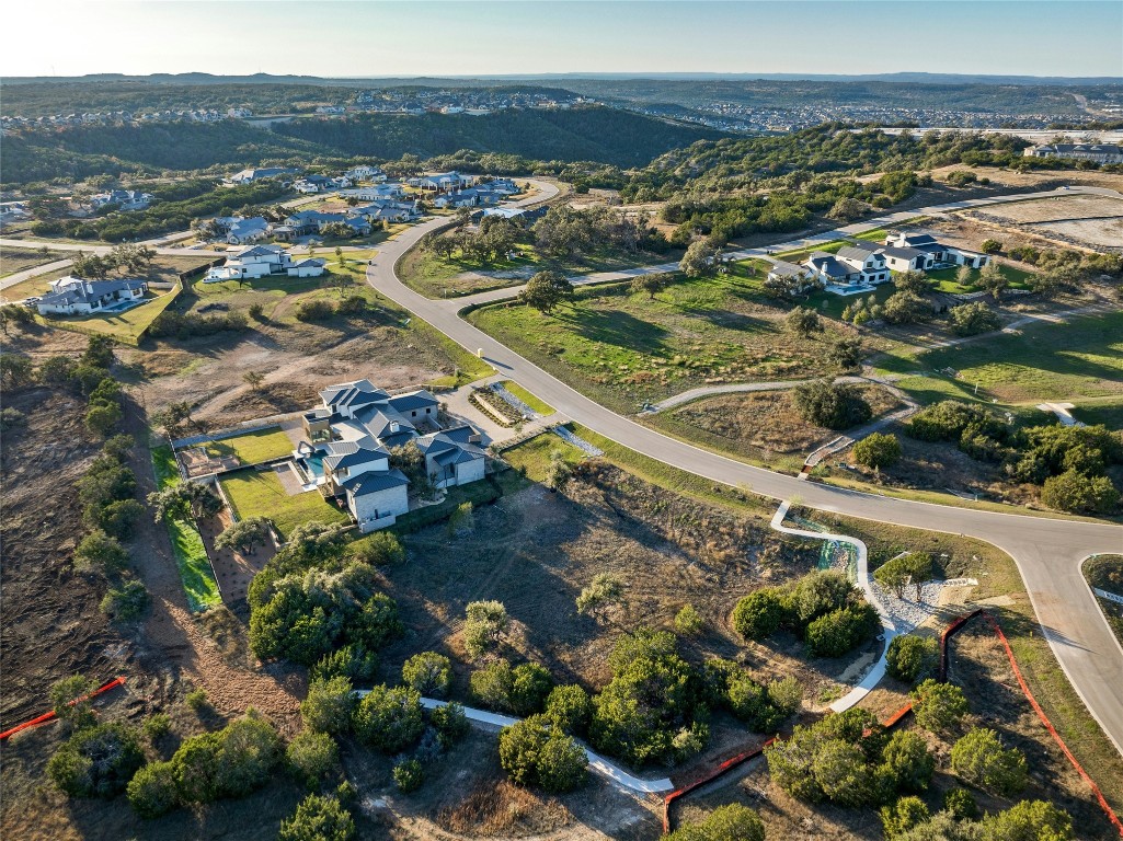 5905 Madrone Tree Lane Austin, TX 78738 - Photo 2 of 25 a view of a city with mountains