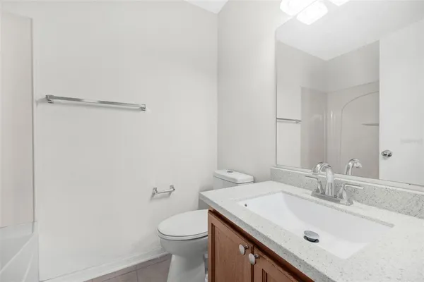 a bathroom with a bath tub and a shower