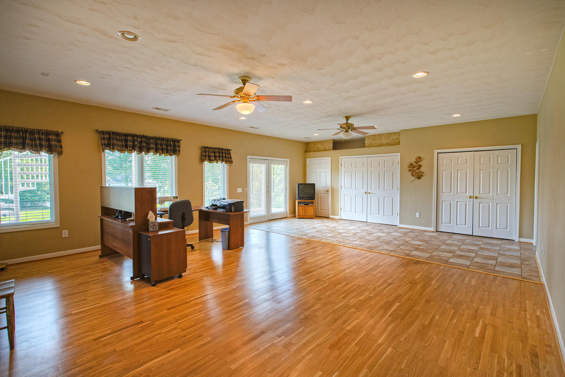 270 Calypso Road Moneta, VA 24121 - Photo 17 of 35 a living room with couches and kitchen view with wooden floor