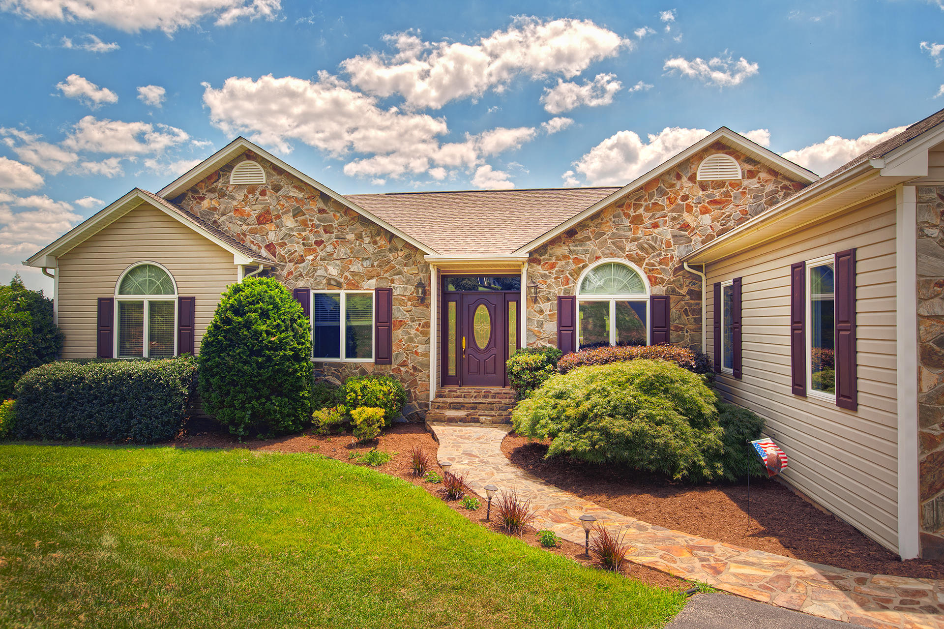 270 Calypso Road Moneta, VA 24121 - Photo 3 of 35 a front view of a house with garden