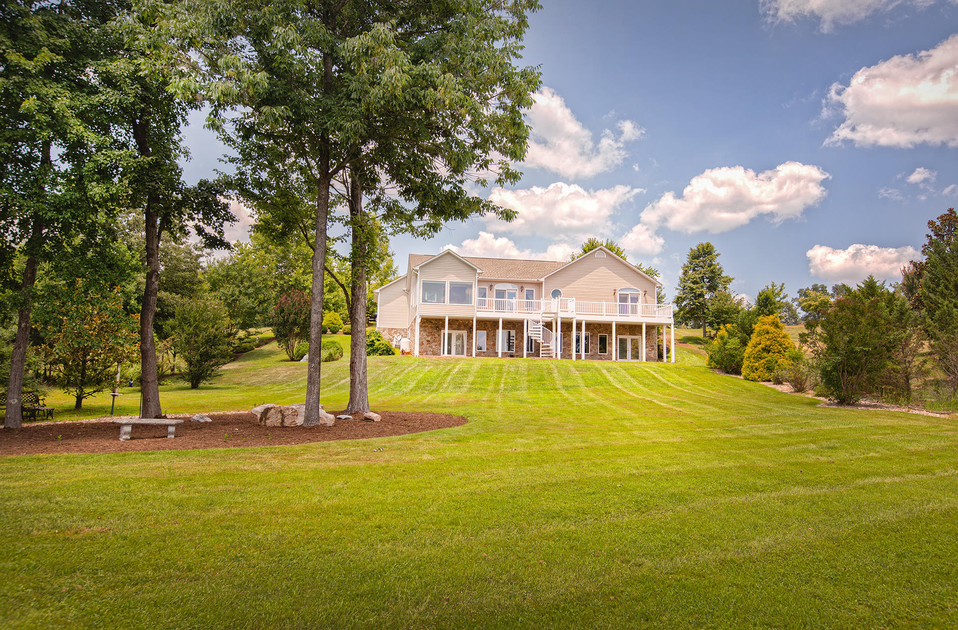 270 Calypso Road Moneta, VA 24121 - Photo 21 of 35 a view of a house with a yard