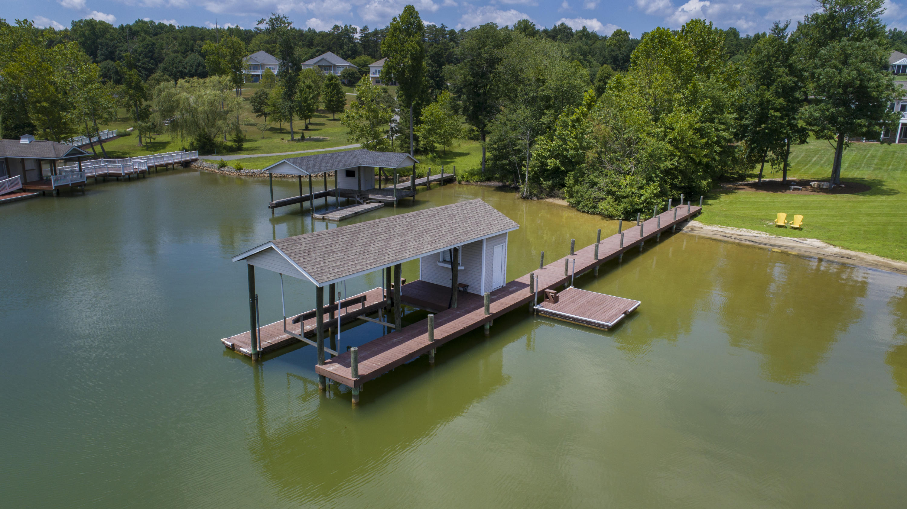 270 Calypso Road Moneta, VA 24121 - Photo 29 of 35 an aerial view of a house with a garden and lake view