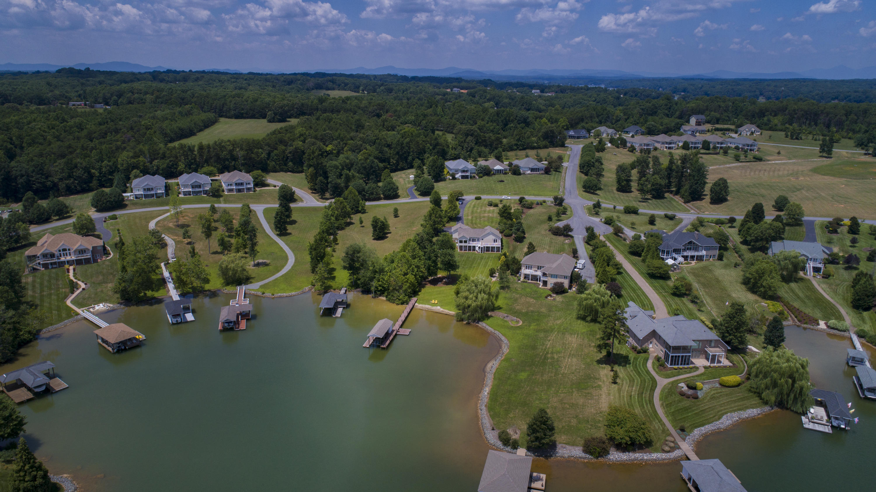 270 Calypso Road Moneta, VA 24121 - Photo 35 of 35 an aerial view of a house with outdoor space and lake view in back yard