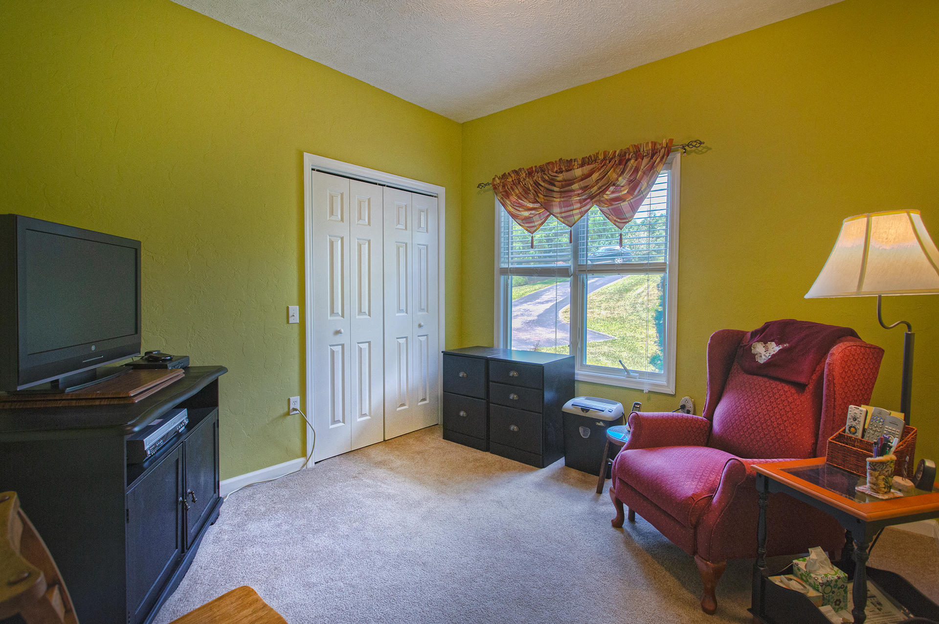 270 Calypso Road Moneta, VA 24121 - Photo 10 of 35 a room with furniture and a flat screen tv