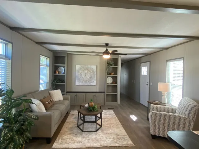 a living room with furniture and a window