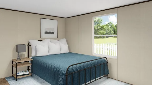 a bedroom with a bed and window