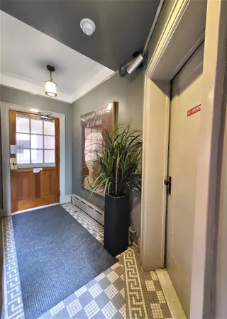 a view of entryway with livingroom and furniture