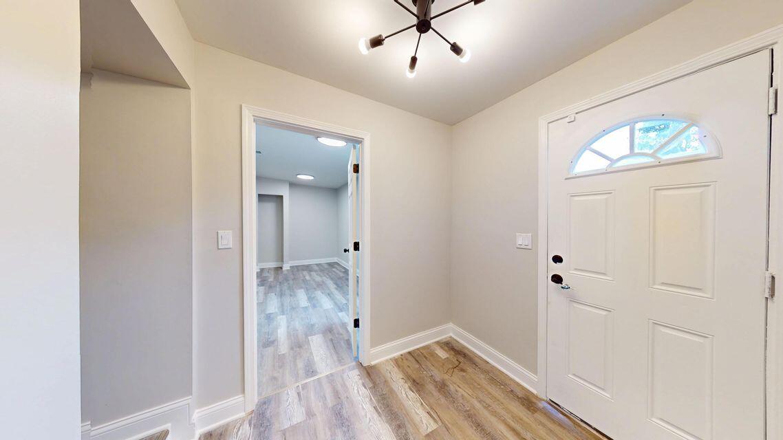 1379 Roosevelt Place, Unit 1 Gary, IN 46404 - Photo 19 of 24 a view of livingroom with hardwood floor and hallway
