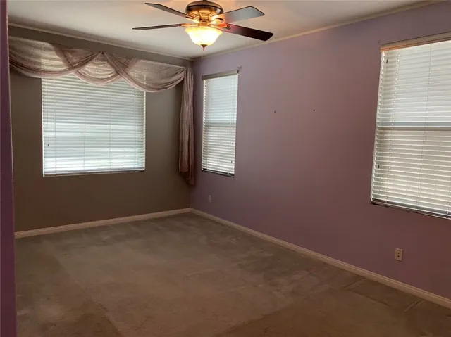 a bathroom with a sink toilet and mirror