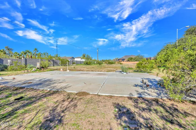 an empty room with windows and entrance