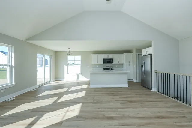 a view of a kitchen with a sink cabinets and a window