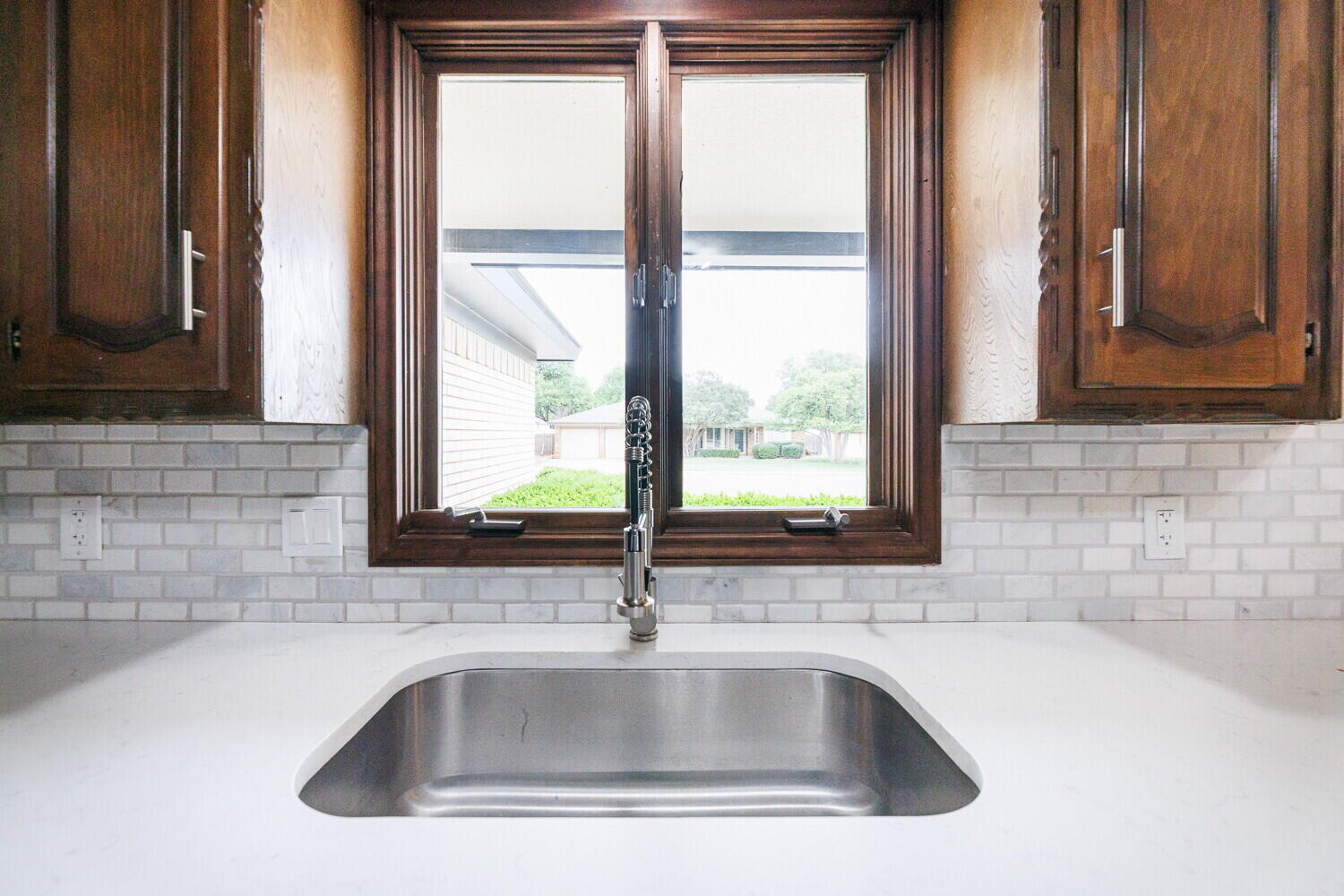 5703 80th Street Lubbock, TX 79424 - Photo 18 of 52 a close view of sink and tap