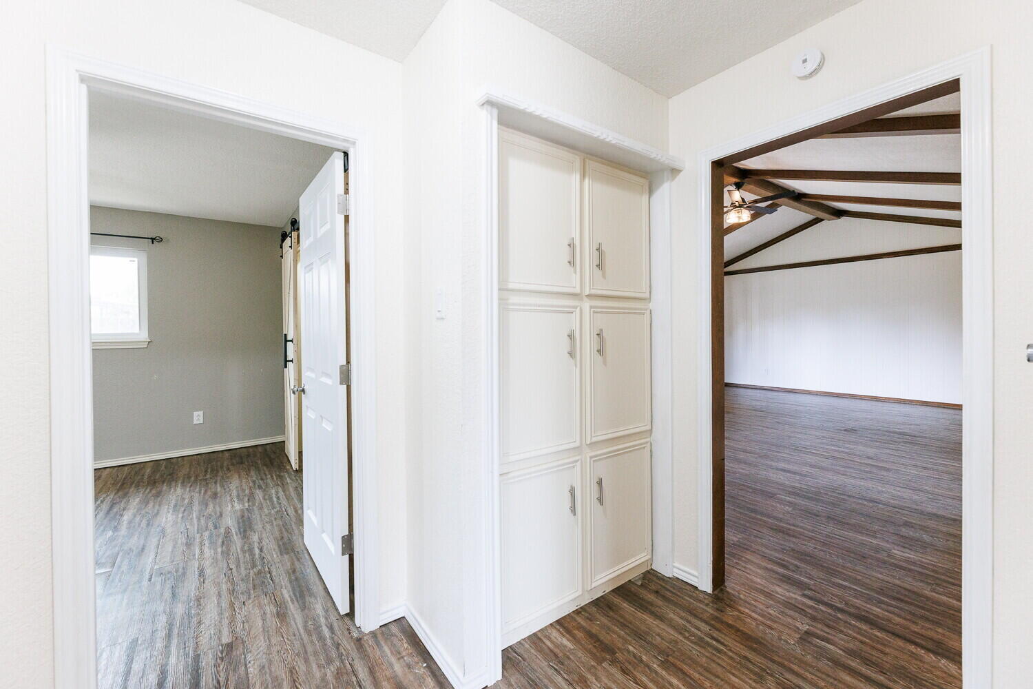 5703 80th Street Lubbock, TX 79424 - Photo 38 of 52 a view of hallway with wooden floor