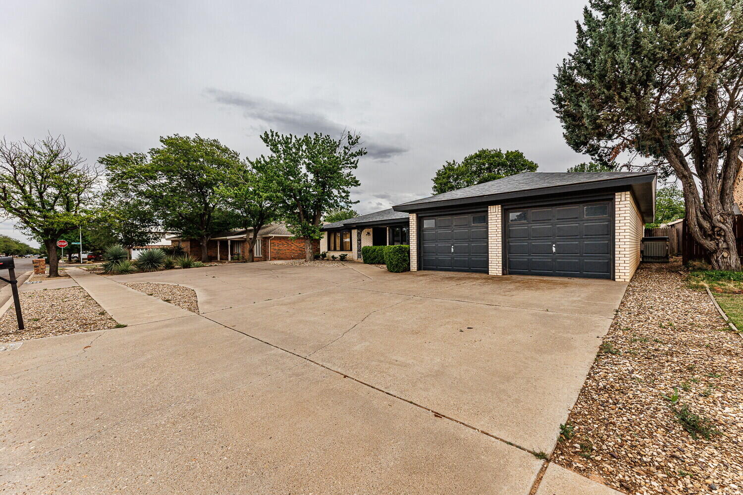5703 80th Street Lubbock, TX 79424 - Photo 4 of 52 front view of a house with a yard