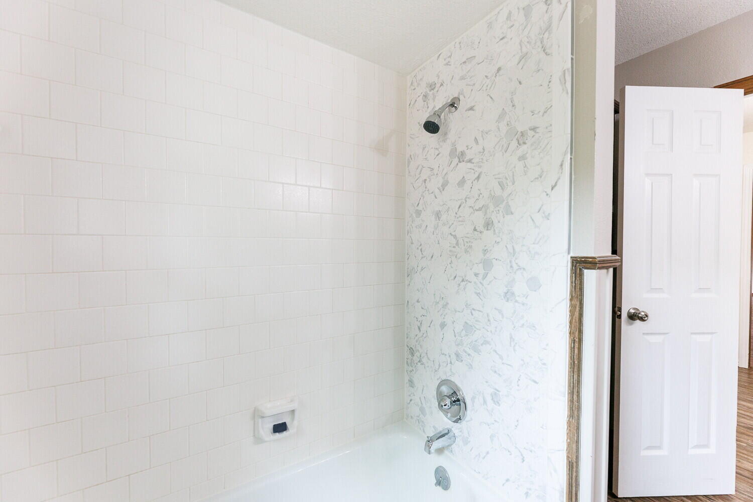 5703 80th Street Lubbock, TX 79424 - Photo 41 of 52 a bathroom with a bathtub