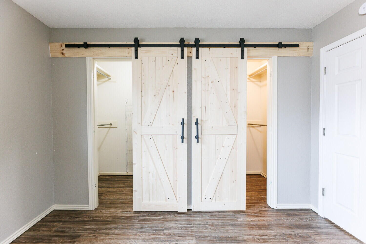 5703 80th Street Lubbock, TX 79424 - Photo 43 of 52 a view of a room with wooden floor and entrance
