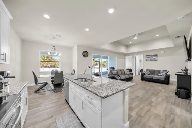 a living room with furniture and a table