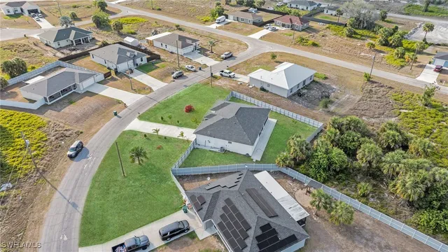 an aerial view of a house with a garden