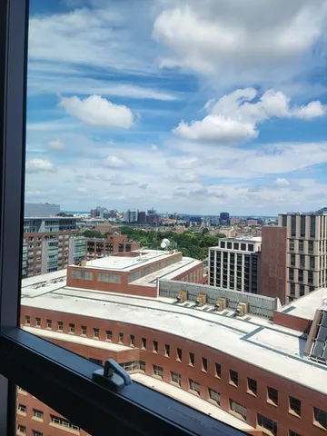 a view of a city that has tall building