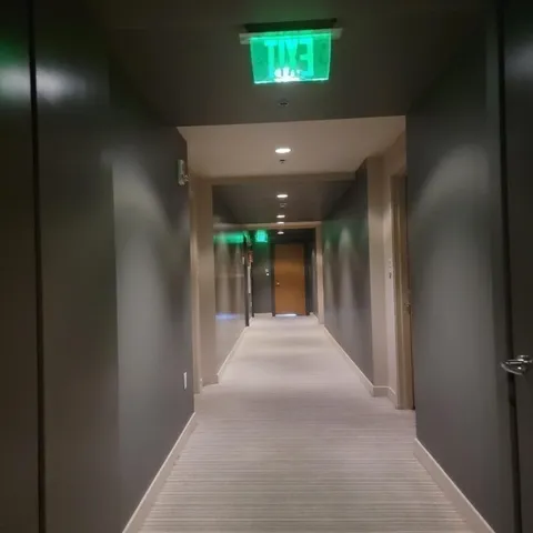 a kitchen with a sink and a microwave