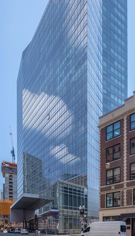 110 Stuart Street, Unit 19D Boston, MA 02116 - Photo 2 of 32 a front view of a building with glass door