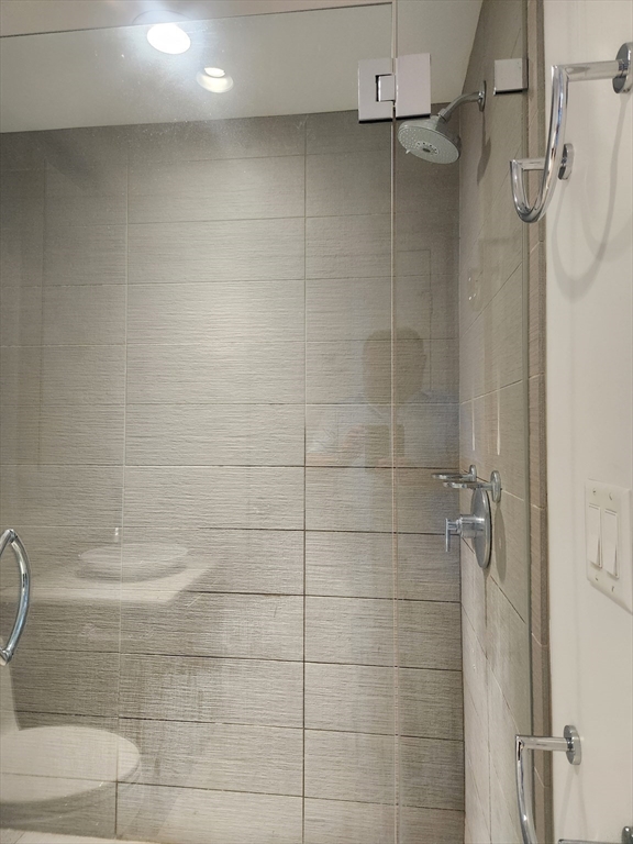 110 Stuart Street, Unit 19D Boston, MA 02116 - Photo 28 of 32 a bathroom with a shower